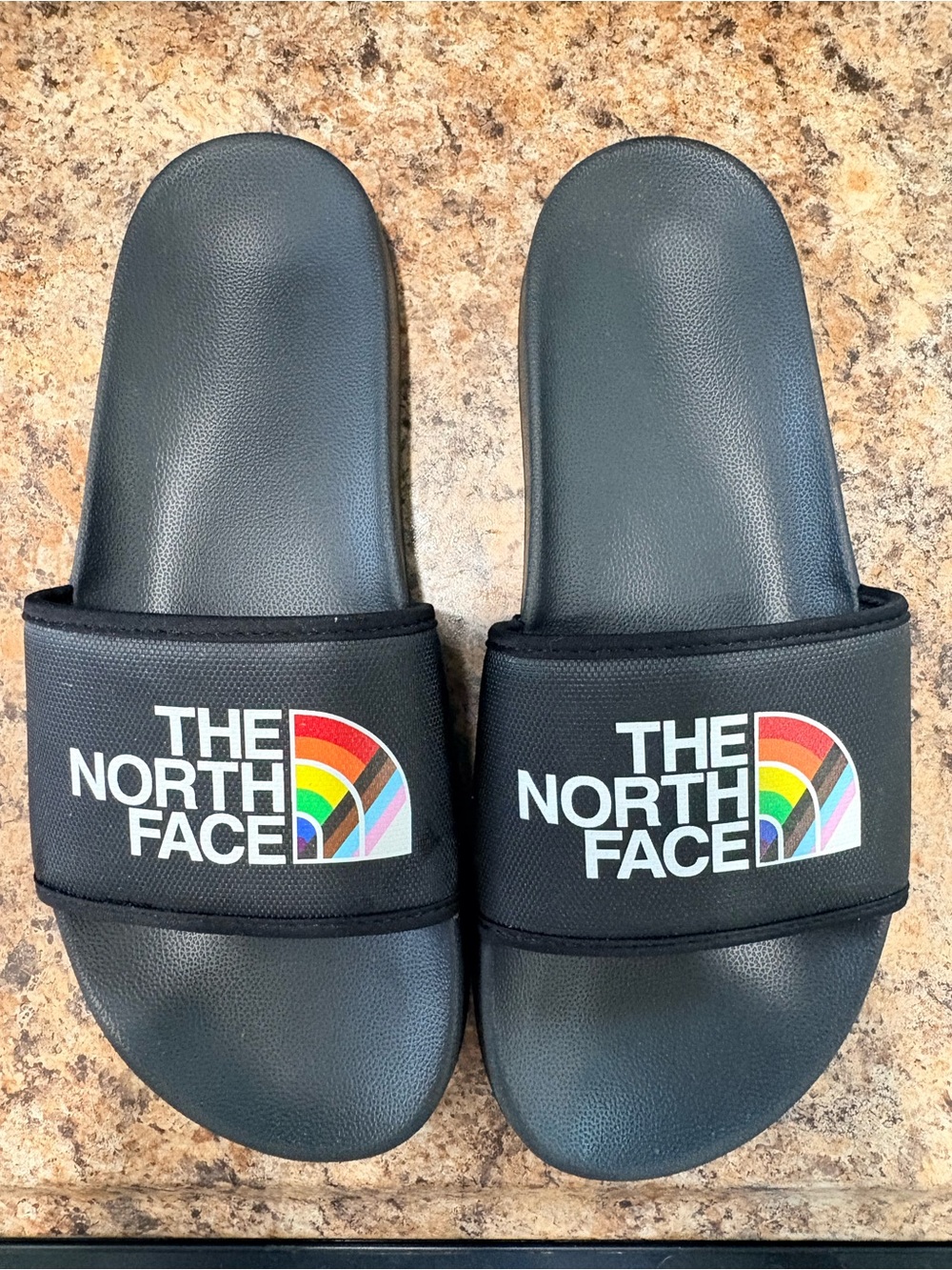 The North Face base camp slide. Pride rainbow flag